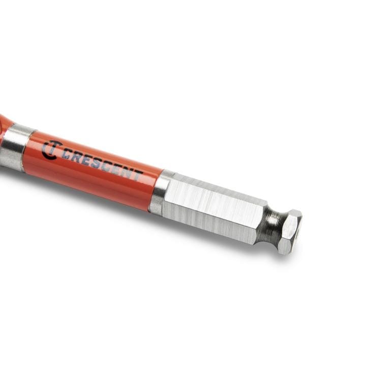 This is the end of a drill bit with a hexagonal shape, designed to fit into a power tool. It has a silver metallic finish and a red band with the brand name "Crescent" printed on it.
