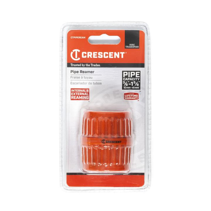 The image shows a Crescent Pipe Reamer in its packaging. It is a tool used to smooth the rough edges of pipes. The reamer is bright orange and made of metal. It has a cylindrical shape with ribbed edges for a better grip and a central opening to insert the pipe. The packaging indicates it can be used for both internal and external reaming and comes with a lifetime warranty.