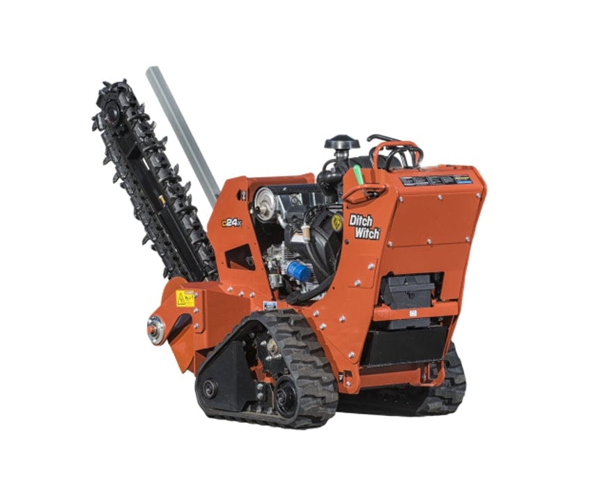 Ditch Witch C24X walk-behind trencher shown from side angle, featuring rubber tracks, chain trencher attachment with cutting teeth, and visible engine compartment. Orange exterior with model branding, designed for trenching in utility and landscaping projects.