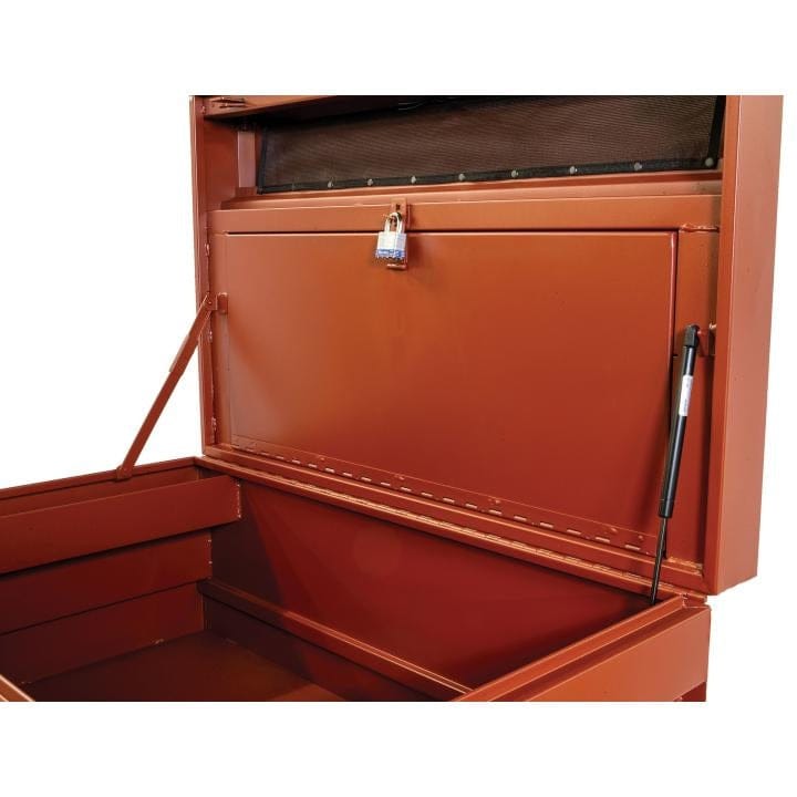 Close-up of Crescent JOBOX chest showing open lid with gas strut and metal arm, and a padlocked internal compartment for secure tool storage.
