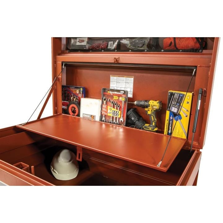 Open Crescent JOBOX storage chest showing top lid, middle shelf, and bottom compartment filled with tools, including a yellow drill and white hard hat