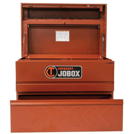Crescent JOBOX chest with open lid and drawer, showing interior compartments and instruction label inside lid, designed for secure jobsite storage.