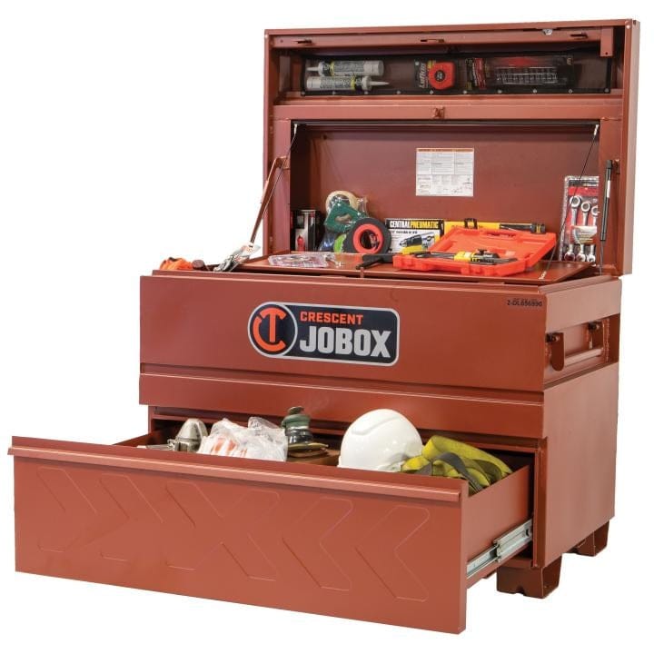 Crescent JOBOX chest with open top and bottom compartments, showing hand tools, red socket tray, flashlight, and safety gear like gloves and hard hat