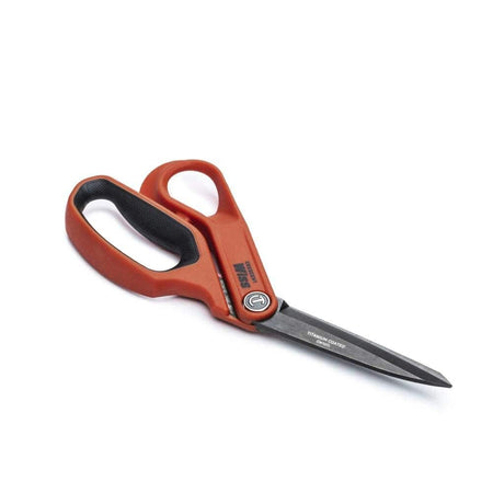 A side view of the Crescent Wiss tradesman shears, demonstrating the offset handle that provides clearance for safe flat-surface cutting.