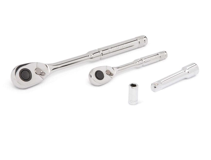 A white background studio shot focusing on the chrome ratchets and extensions from the tool set, including a 1/4" drive ratchet, a 3/8" drive ratchet, and two chrome extensions, highlighting their polished finish.
