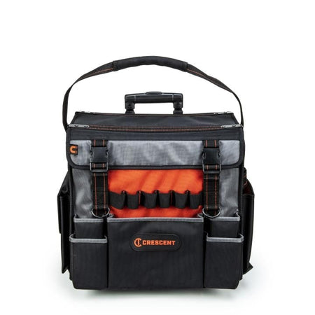 Professional-grade tool bag with reinforced sides, hard bottom, and orange-stitched handle. Includes multiple compartments and flap pocket with “TECH OT-MC” and “VETO PRO PAC” branding. Built for durability and tradesperson use.