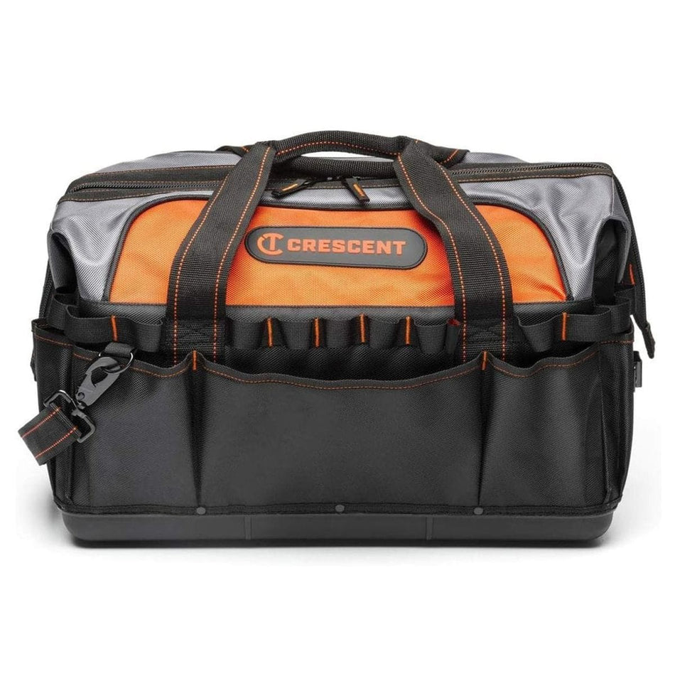 A straightforward, eye-level studio shot of the closed Crescent 20-inch contractor tool bag, highlighting the hard polypropylene base, the black and orange color scheme, and the front exterior pockets.