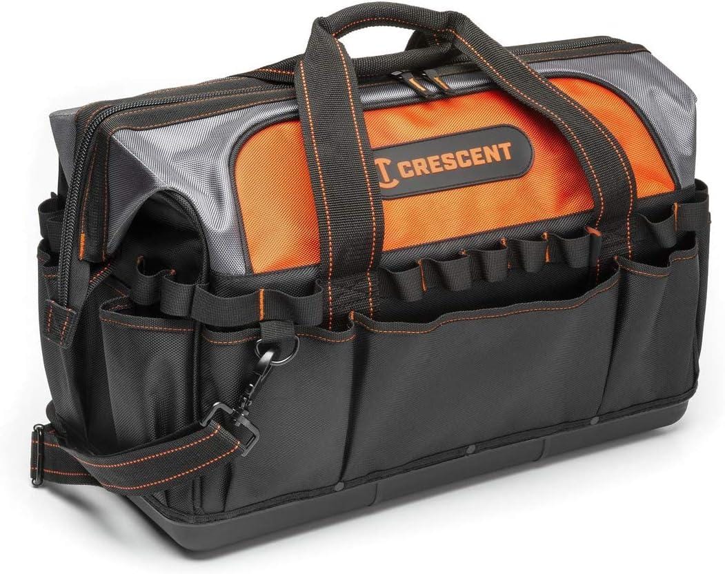 A close-up, angled view of the Crescent 20-inch tool bag, showing the zippered top, padded carrying handles, multiple black exterior pockets, and the orange and gray 1680D polyester fabric.