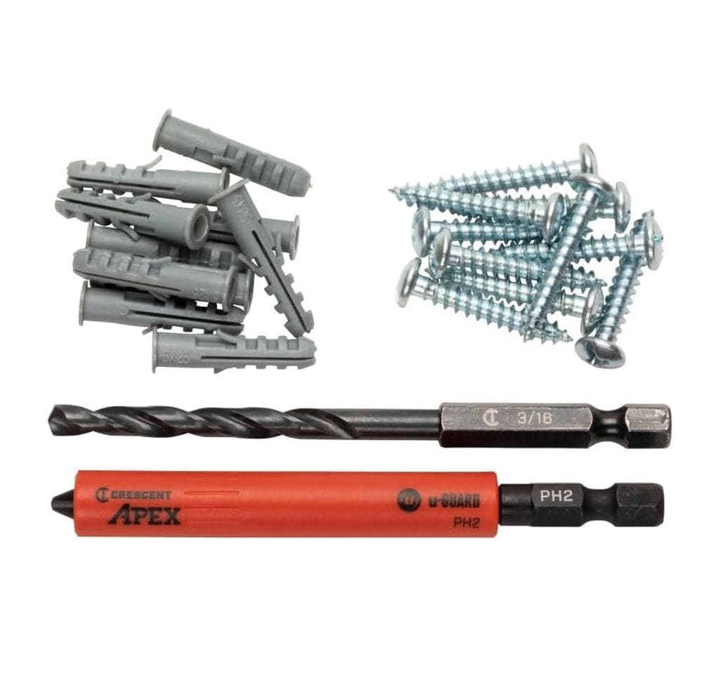 A complete product display of the Crescent APEX u-GUARD drywall anchor kit featuring a non-marring Phillips power bit, a 3/16 inch black oxide drill bit, ten gray push-in anchors, and ten zinc-plated mounting screws.