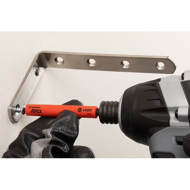 The Crescent non-marring Phillips bit in use with an impact driver to secure a long metal wall bracket, highlighting the enhanced control and safety of the free-spinning u-GUARD sleeve.