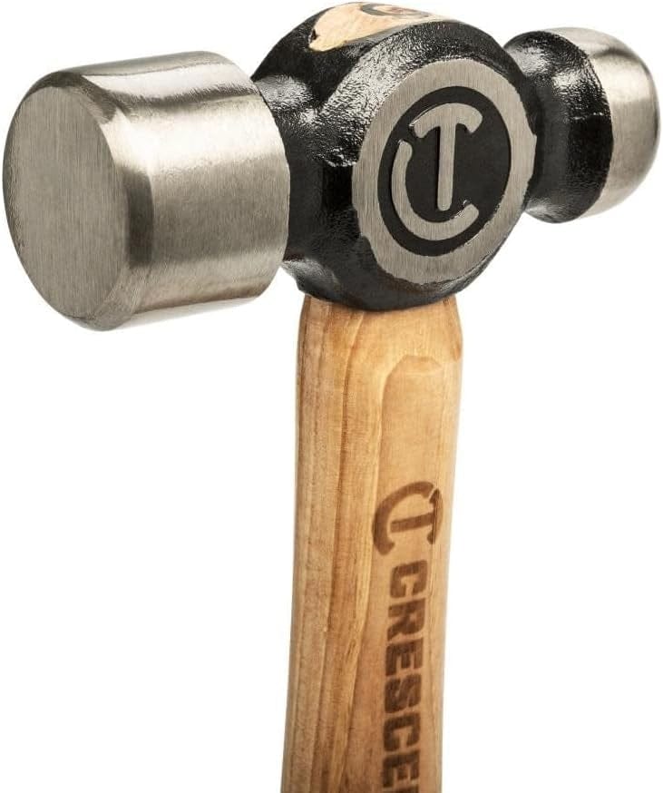 Close-up of the flat striking face on the Crescent forged alloy steel hammer head, displaying precision ground edges and the laser-etched Crescent brand logo.