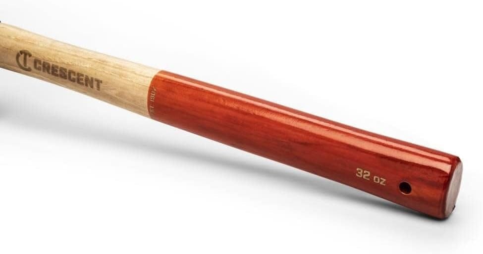 Close-up view of the base of the grade A hickory handle, featuring a red lacquer finish, a hang hole for convenient storage, and the weight marking of the striking tool.