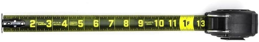 Top-down view of the extended Crescent Lufkin Shockforce Nite Eye tape measure blade showing the high-visibility neon green measurements against the dark matte black background.