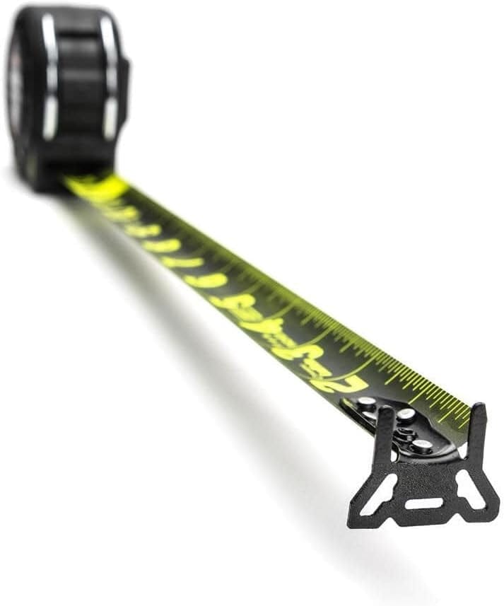Close-up of the durable multi-catch end hook on the Crescent Lufkin Shockforce Nite Eye tape measure with the two-sided black and green high-contrast blade extending outward.