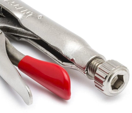 Extreme close-up of the locking pliers' adjustment screw, highlighting the knurled grip, the red release lever, and the hex key recess for additional tightening leverage