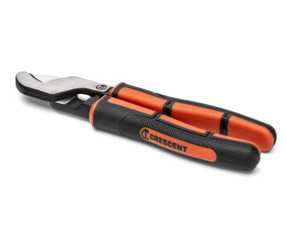 Side profile of the Crescent electrical cable cutter resting on a white surface, showcasing the slim tool design and high-leverage pivot point intended for effortless cable slicing.