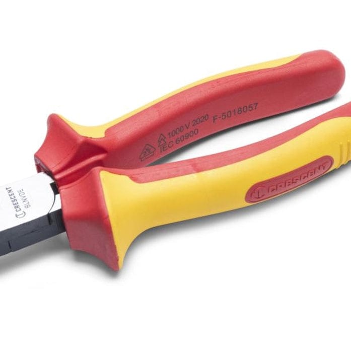 Extreme close-up of the insulated handle and pivot joint, clearly showing the VDE 1000V certification stamp and the red and yellow ergonomic handle material