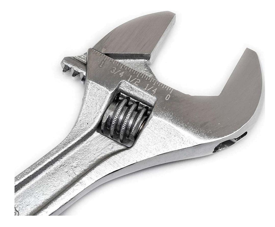 A close-up of the chrome jaw and knurl of the Crescent 6-inch adjustable wrench, showing the etched SAE fractional measurement scale (0, 1/4, 1/2, 3/4 inch).