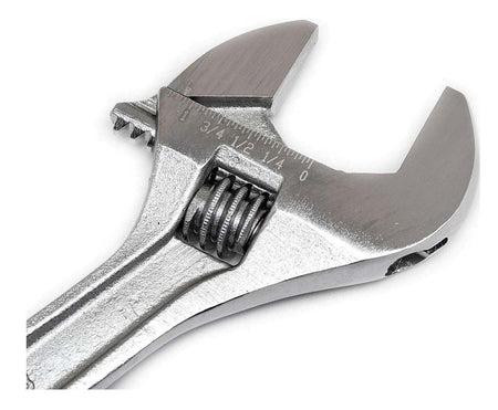 A close-up of the chrome jaw and knurl of the Crescent 6-inch adjustable wrench, showing the etched SAE fractional measurement scale (0, 1/4, 1/2, 3/4 inch).