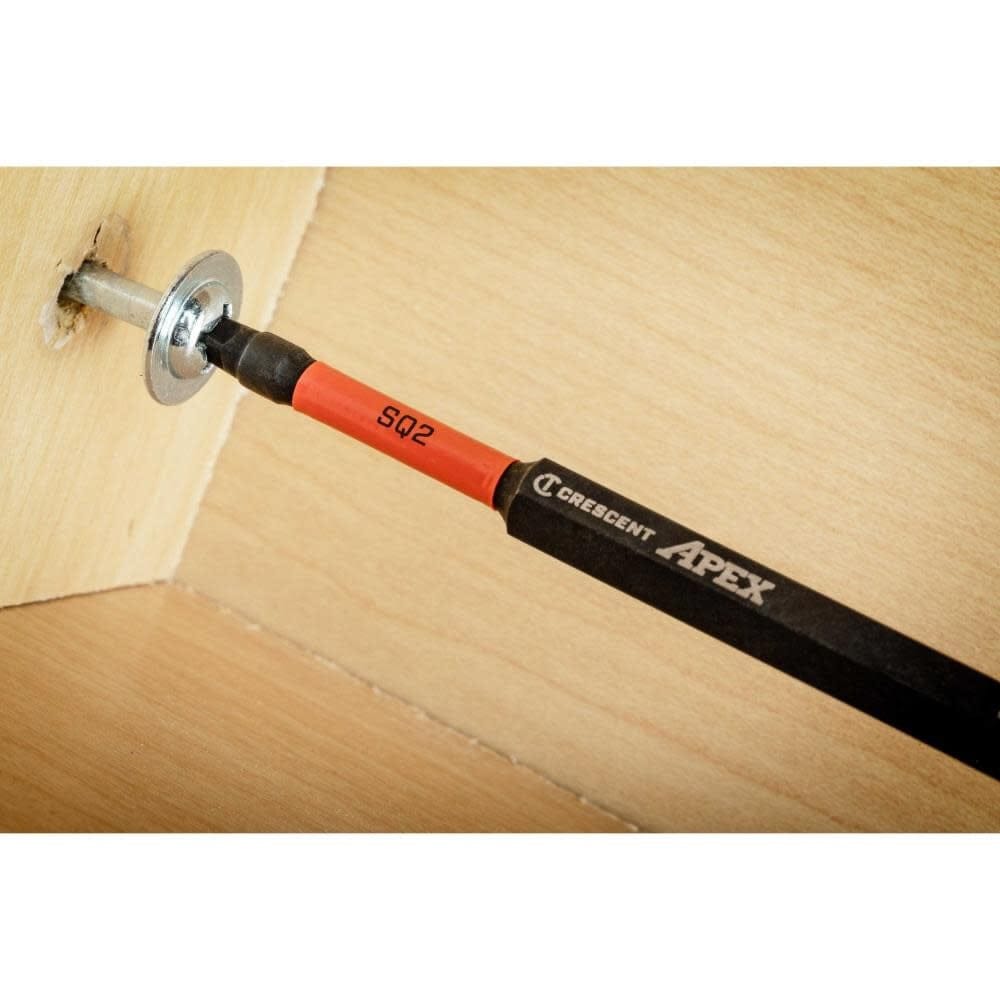 Close-up action shot of the Crescent APEX #2 square bit driving a screw into wood, highlighting the red size identification band and laser etched logo.