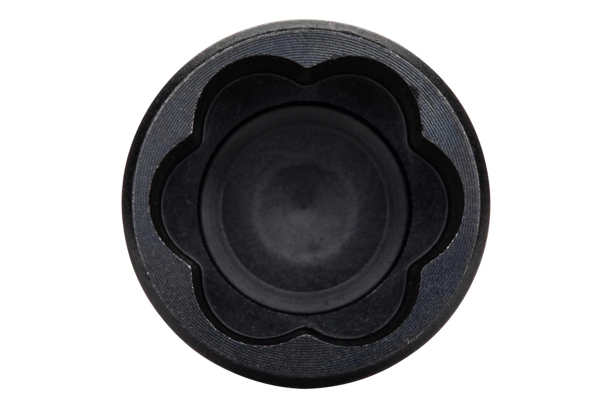 Top-down close-up macro view looking directly into the socket of the Crescent APEX 1/2-inch Bolt Biter, revealing the unique internal tapered flute bi-directional design engineered to grip severely damaged hex fasteners.