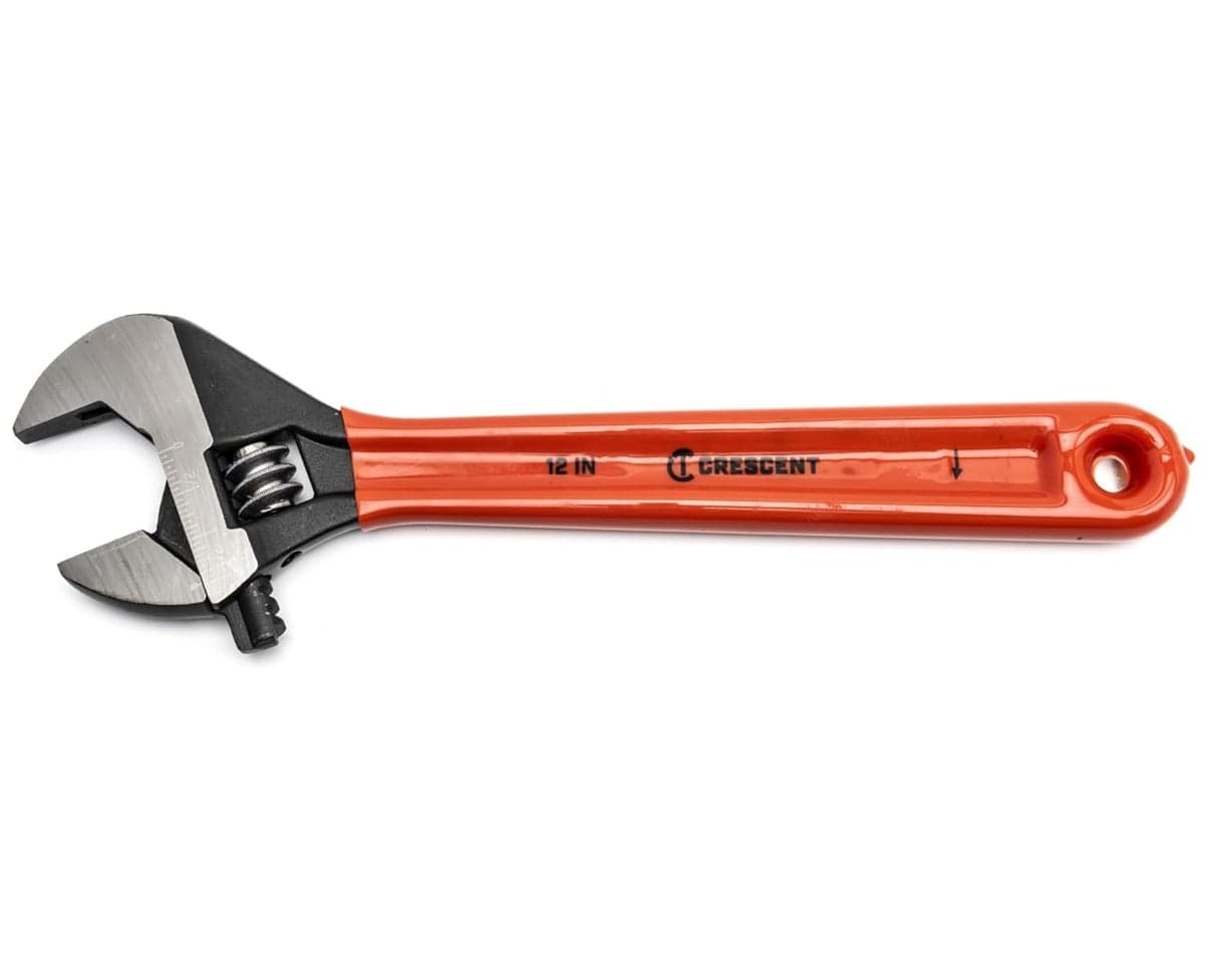 A studio profile view of the Crescent AT212CVS 12-inch adjustable wrench featuring a heavy-duty black oxide finish and a bright orange ergonomic cushion grip handle, shown against a clean white background.