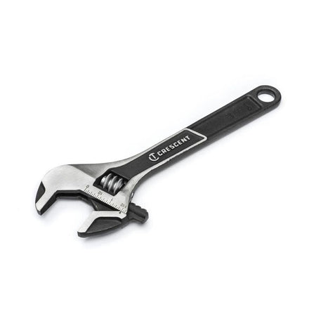 An angled studio perspective shot looking down at the complete 10-inch Crescent wide jaw adjustable wrench, displaying the embossed Crescent brand name across the central handle groove.