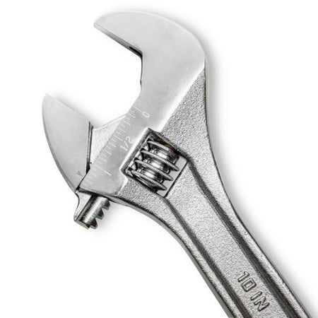 Detailed macro image of the 10-inch heavy-duty adjustable wrench head from the Crescent AC2610VS set. This view highlights the wide 1-5/16 inch jaw opening capacity, fractions scale tracking system, and premium heat-treated forged steel alloy texture.