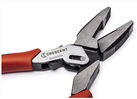 An angled perspective of the open jaws on the Crescent CCA20509 lineman's pliers, showcasing the induction-hardened cutting edges and the specialized compound leverage design that provides 40 percent more cutting power.