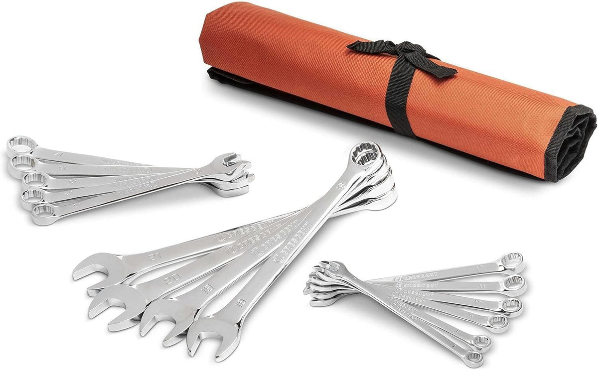 A comprehensive studio shot of the Crescent CCWS5-05 15-piece metric combination wrench set featuring full polish chrome tools arranged with their heavy-duty orange reinforced storage tool roll.