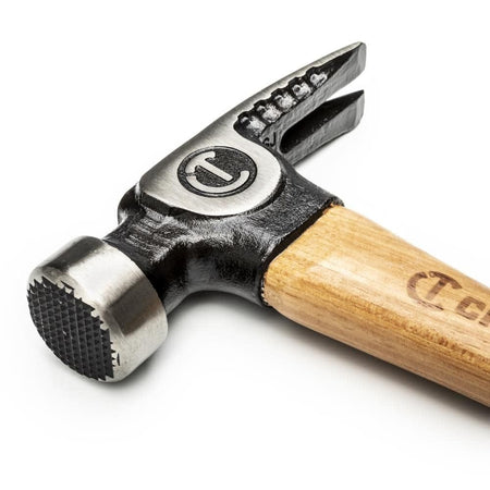 Detailed view of the Crescent CHFRAM22 hammer head focusing on the checkered milled face and the sharp ripping claw for professional construction work.
