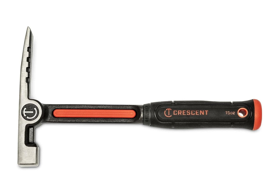 A full profile view of the Crescent CHSBK15 15 oz brick hammer featuring a forged alloy steel head with a traditional smooth striking face and a specialized chisel blade on a durable steel handle with an ergonomic black and orange textured grip.