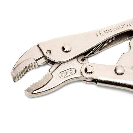 A close-up detail of the Crescent locking pliers head, showcasing the angled tooth pattern engineered for a superior non-slip grip on rounded fasteners, nuts, and bolts.
