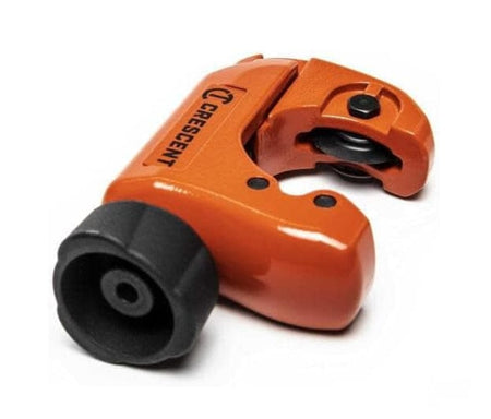 A detailed studio shot of the Crescent 1-1/8 inch pipe cutter emphasizing the heavy-duty cast metal construction and the specialized tri-lobed adjustment knob designed for maximum grip and comfort.