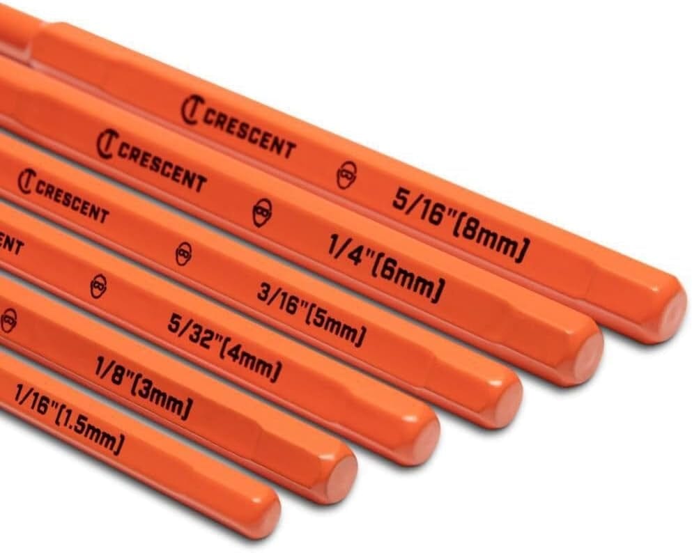 A detailed view of five Crescent pin punches lined up, emphasizing the high-viz coloring and bold, easy-to-read size markings ranging from 1/16-inch to 5/16-inch for quick identification.