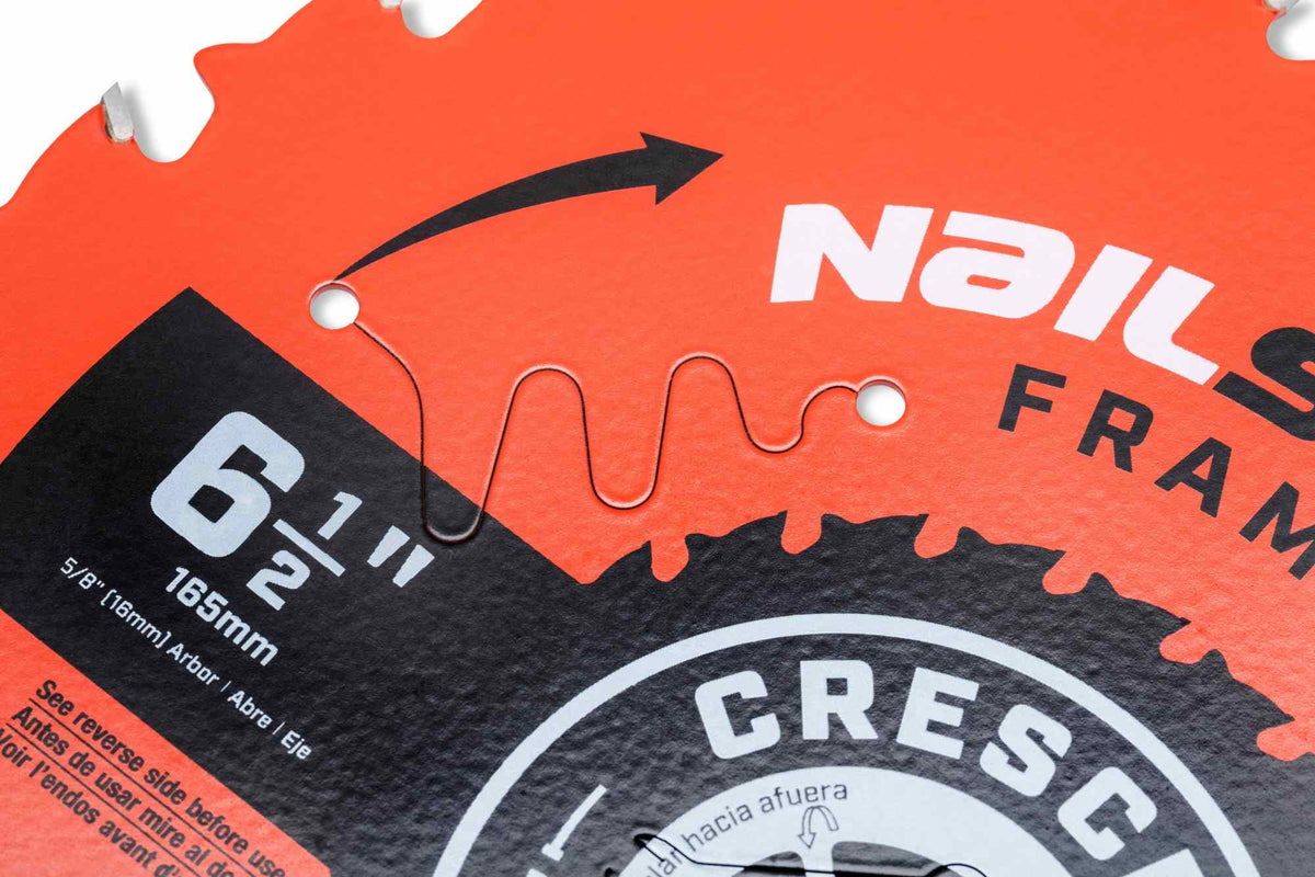 Technical detail of the laser-cut vibration and expansion slots on the Crescent 6-1/2 inch framing blade, designed to minimize noise and prevent blade warping during heavy-duty cutting.