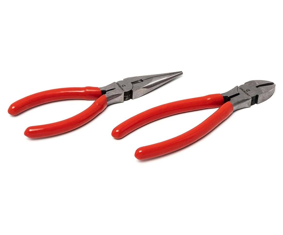 A studio shot of the Crescent diagonal cutters and long nose pliers featuring professional ergonomic red dipped grips and precision-ground cutting edges.