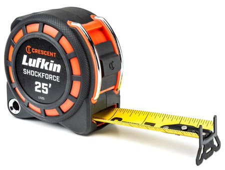 Perspective shot of the Crescent Lufkin Shockforce 25-foot tape measure featuring a rugged black and orange impact-resistant housing and a high-visibility yellow blade partially extended.