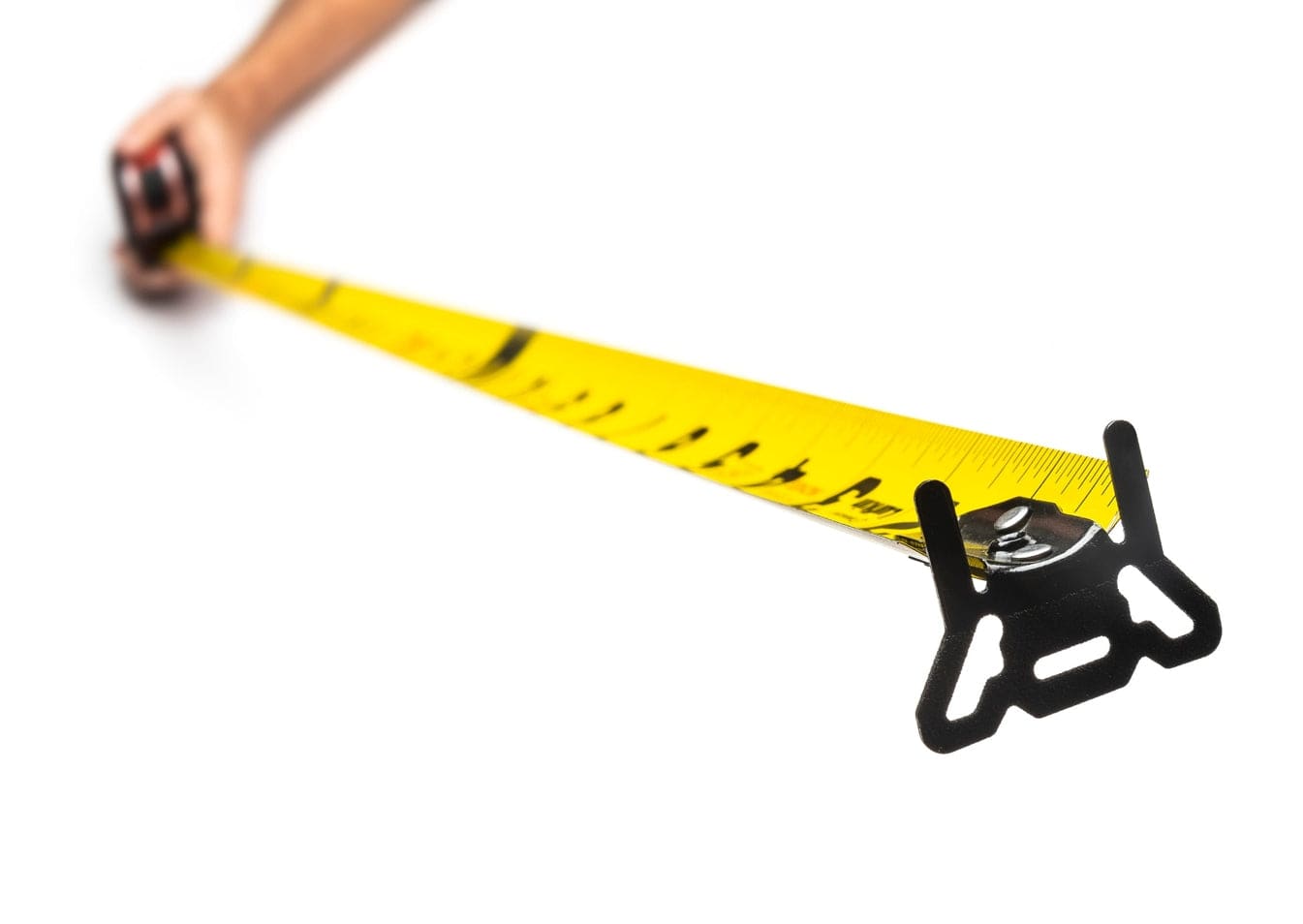 Extreme perspective view looking down the length of the extended Crescent Lufkin Shockforce tape measure blade toward the heavy-duty 360-degree diamond-coated end hook.