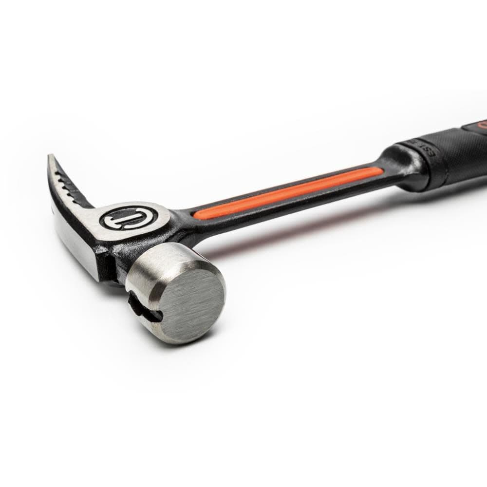 A close-up view of the polished smooth face on the Crescent 22oz framing hammer, designed for powerful striking without marring wood surfaces, and showing the integrated nail starter slot.