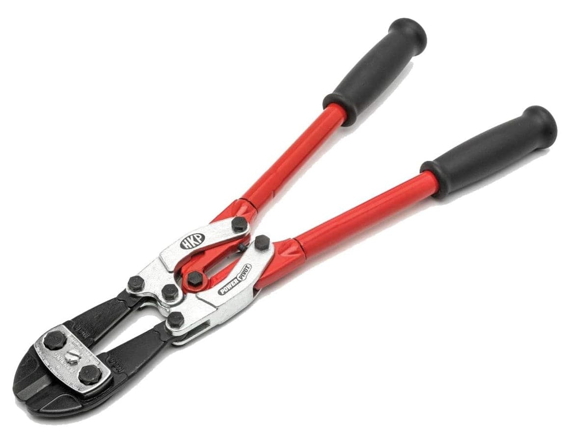 Angled studio view of the Crescent H.K. Porter PowerPivot bolt cutter, highlighting the heavy-duty cutting head and the red tubular steel handles with black grips