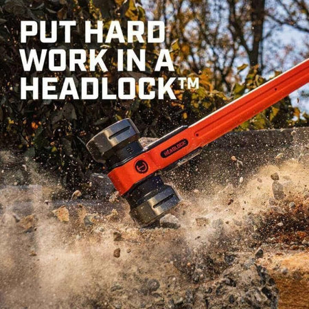 A high-impact action shot of the Crescent HEADLOCK sledgehammer striking a concrete block, demonstrating the tool's power and durability with the marketing slogan Put Hard Work in a HEADLOCK.