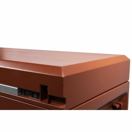 Top corner of a brown metal Crescent JOBOX chest with a cutout revealing a control panel labeled 'MODE' with options 'BASIC' and 'FULL.' Designed for secure storage with integrated locking or access control features.