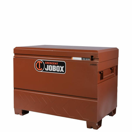 Closed Crescent JOBOX storage chest with reddish-brown finish, side handles, and secure locking lid. Elevated base supports forklift access. Branding and rugged design indicate industrial-grade durability.