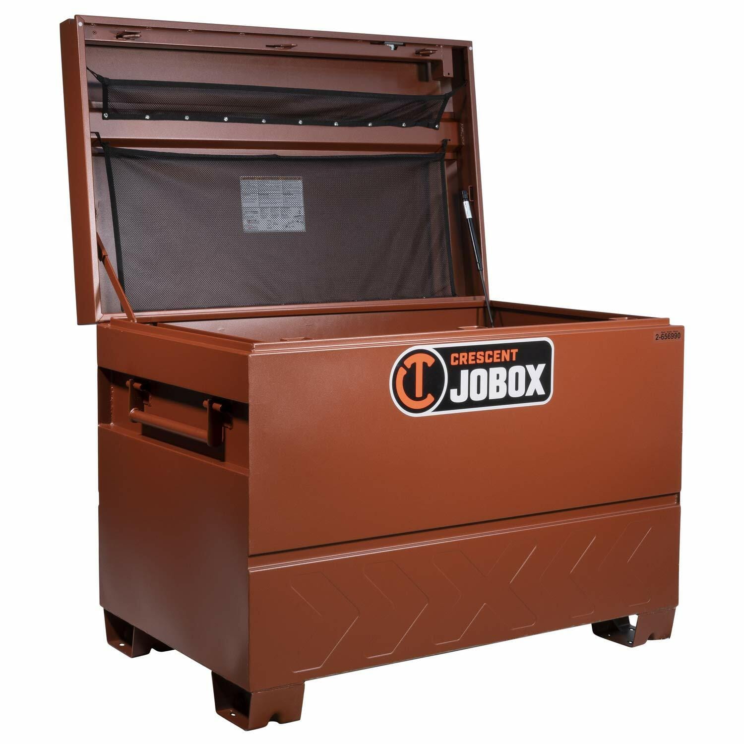 Open Crescent JOBOX chest with spacious interior, gas strut-supported lid, and mesh panel inside lid. Heavy-duty metal construction with side handles and reinforced base for secure tool storage on job sites."