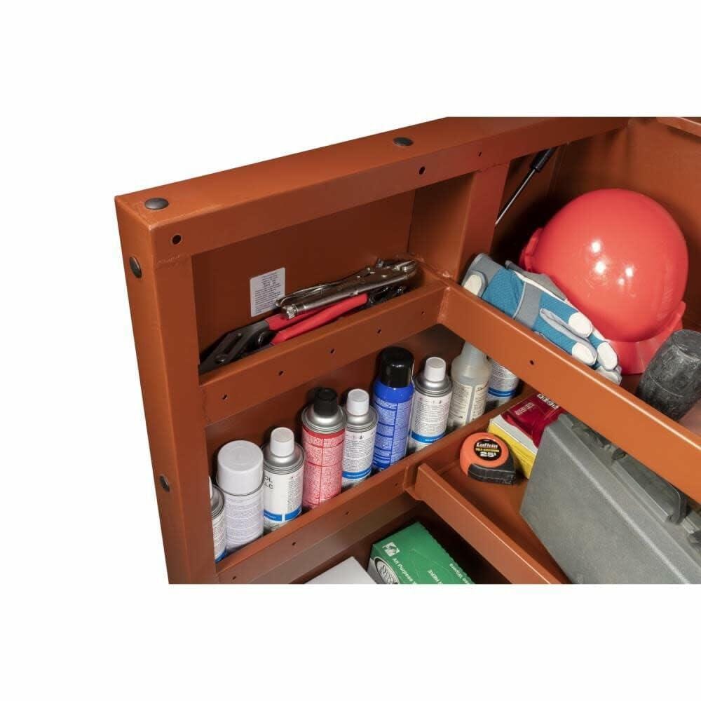 Open tool cabinet with various tools and supplies inside