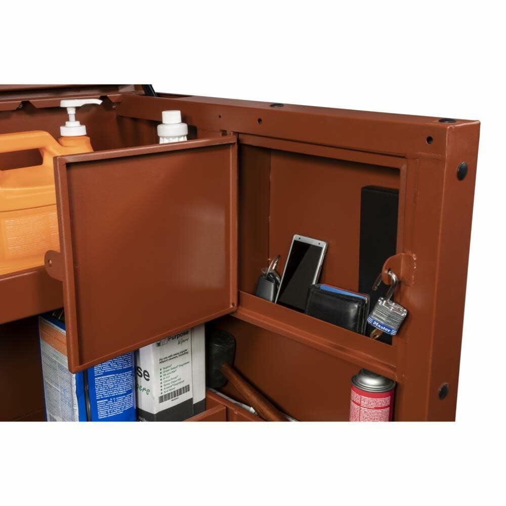 Brown storage cabinet with open door showing various items inside