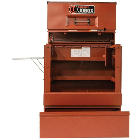 Crescent JOBOX 48-inch Site-Vault heavy-duty piano box jobsite storage cabinet, viewed from the front, open and empty. The bottom drawer is extended.