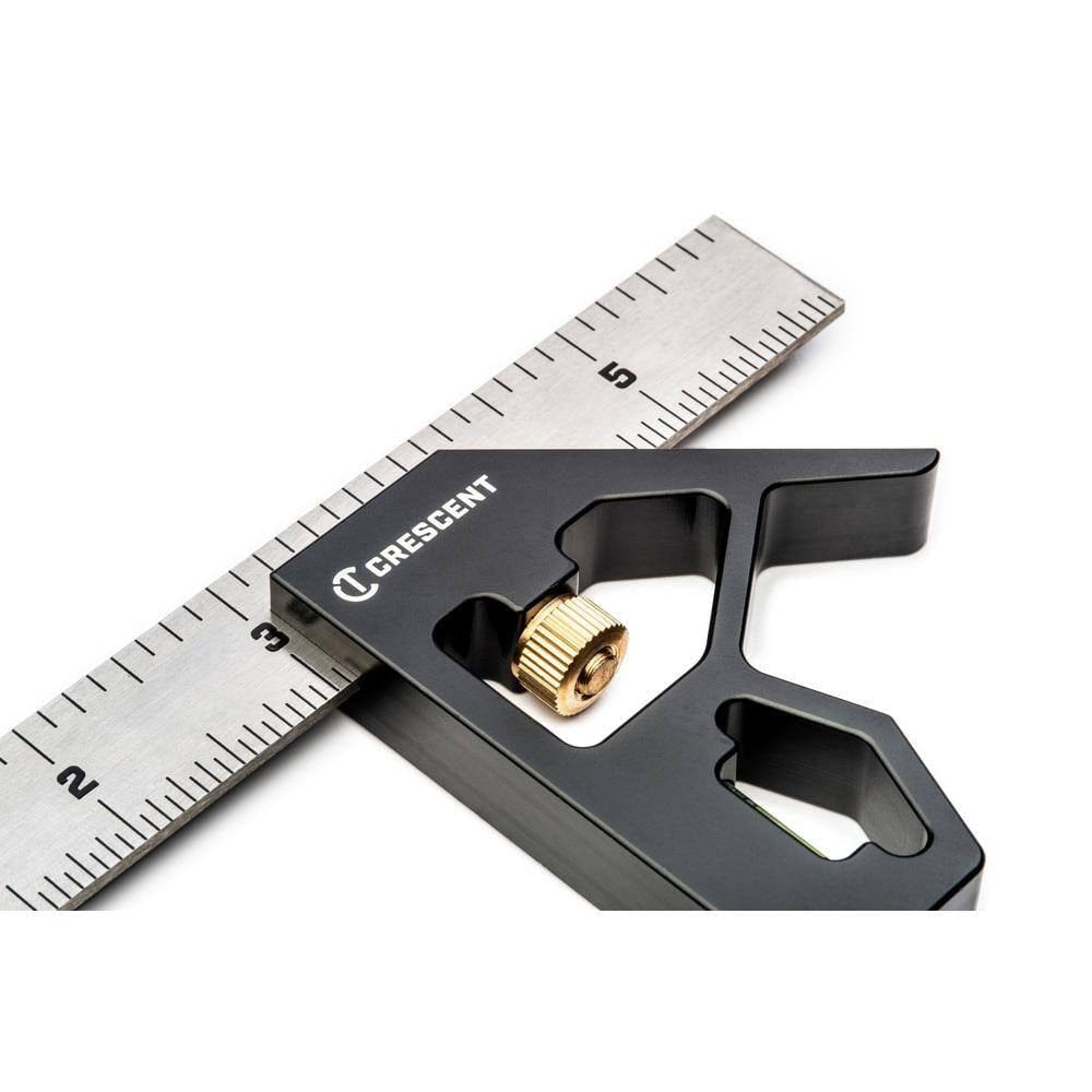 Close-up perspective of the black square head clamped onto the silver blade, focusing on the white Crescent logo and the brass knurled nut mechanism.