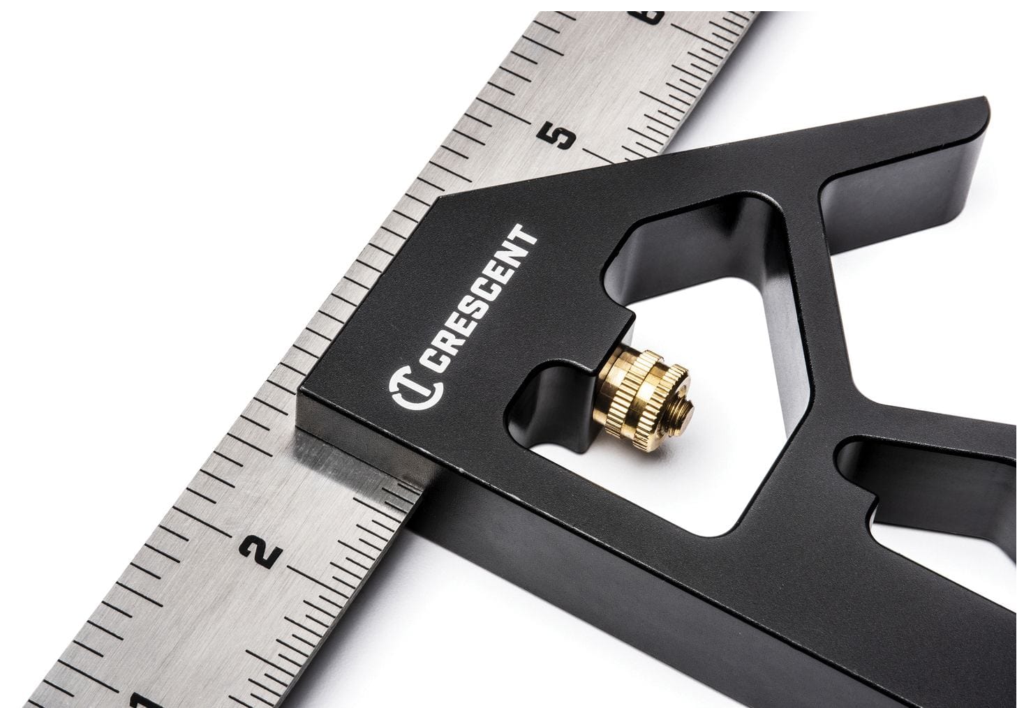 Detailed view of the knurled brass adjustment nut on the Crescent L12CS combination square used to securely lock the ruler into the aluminum head for precise measurements.